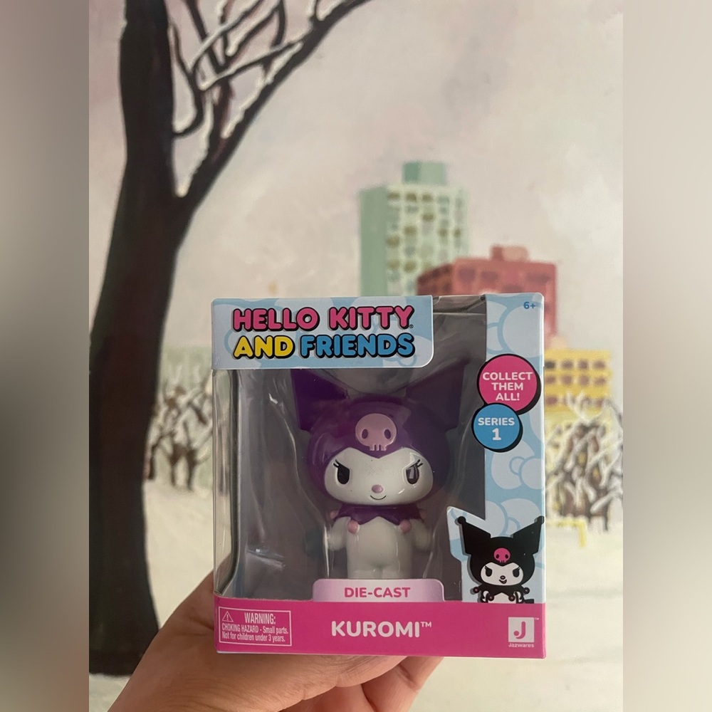 Kuromi and hello kitty die cast figures 2 figures included